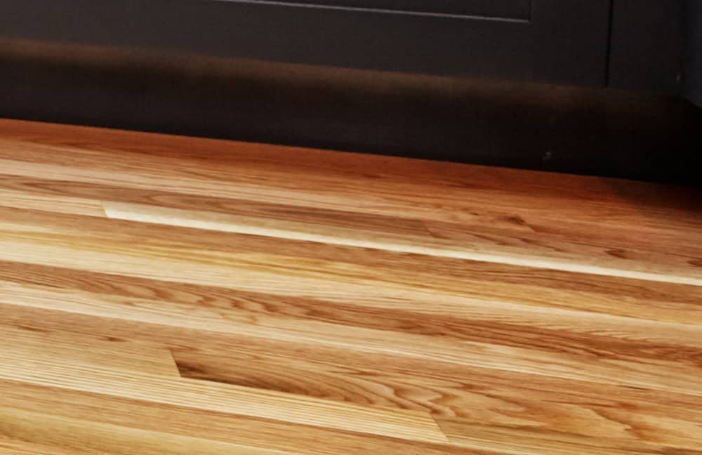 Rich hardwood flooring in a modern home interior.