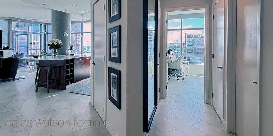 Stylish modern indoor apartment with polished hardwood flooring and city views.